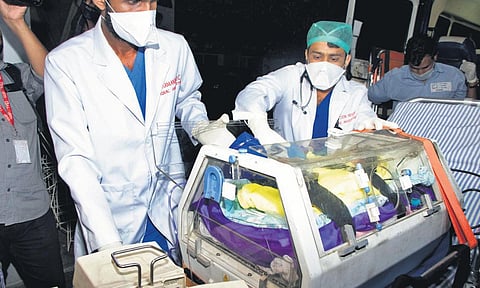 Newborn baby from Nagercoil being brought to Lisie Hospital in Kochi on Tuesday