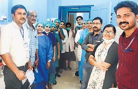 Dr Rijith Krishnan (left) with his team working with Covid patients at the District Hospital in Kanhangad. (Photo | EPS)