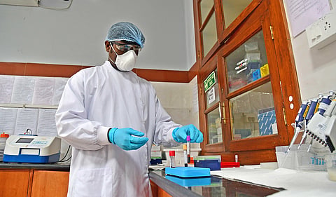 A technician working in a virology lab. (File Photo | EPS)