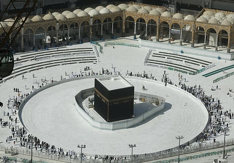 Muslims circumambulate the Kaaba, the cubic building at the Grand Mosque, in the Muslim holy city of Mecca, Saudi Arabia. (File Photo | AP)