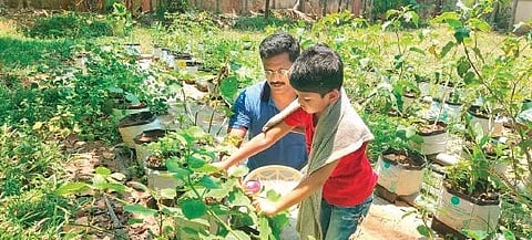 Ernakulam Rural S P K Karthik and his son at the farm