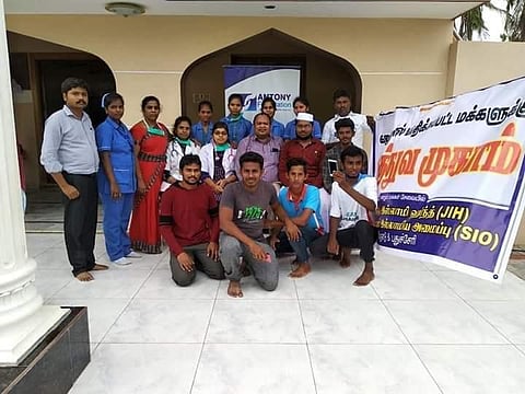 A file photo of Dr Simon with his team and members of Students islamic organisation during a medical camp in Nagapattinam in 2018. (EPS)