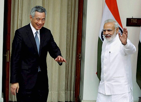 Prime Minister Narendra Modi with his Singapore counterpart Lee Hsien Loong before their meeting at Hyderabad House in New Delhi. | PTI