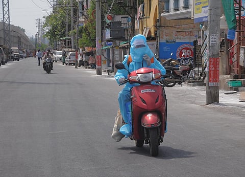 A railway employee on his way back home in Vijayawada. (Photo| EPS/ Prasant Madugula)