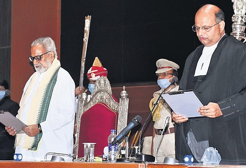 Governor Prof Ganeshi Lal administers oath to Chief Justice Mohammad Rafiq at Lok Seva Bhawan in Bhubaneswar on Monday | Express