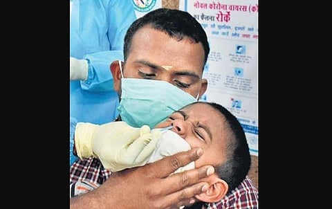 Samples being collected from police personnel and their family members in Kovai | U RAKESH KUMAR