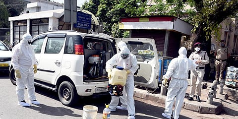 A health worker sanitizes an area near Nizamuddin mosque after people who attended a religious congregation at Tabligh-e-Jamaat tested postive for COVID-19 in New Delhi. (Photo| Parveen Negi, EPS)