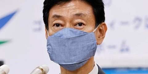 Japan’s Economy Minister Yasutoshi Nishimura speaks at a press conference in Tokyo after meeting with a panel of experts on the new coronavirus. (Photo| AP)
