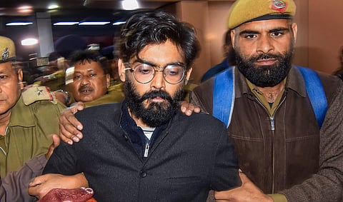 Sharjeel Imam former student of JNU being brought by Assam Crime Branch and Delhi police from Tihar Jail for his alleged controversial remark on North East States at Guwahati Railway station in Guwahati Thursday Feb. 20 2020. (Photo | PTI)