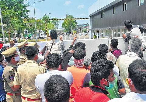 Kin of those killed in styrene gas leakage staging a protest with the bodies at LG Polymers plant in  Visakhapatnam on Saturday (Photo | G Satyanarayana, EPS)