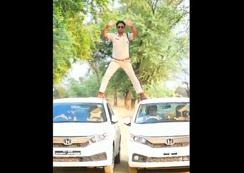 Sporting shades as the hero of the cop drama film and wearing his police uniform, Yadav got the entire episode video-graphed. (Photo | Twitter)