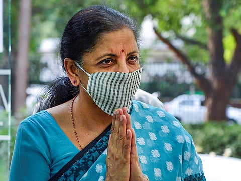 Union Finance Minister Nirmala Sitharaman wearing a home-made protective mask arrives to resume office in New Delhi Wednesday April 13 2020.  (Photo | PTI)