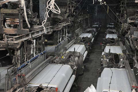 A power loom unit which has been shut during ongoing COVID-19 lockdown in Surat Tuesday May 12 2020. (Photo | PTI)