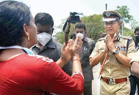 A woman from RR Venkatapuram pleading with DGP Gautam Sawang for help  at the LG Polymers plant in Visakhapatnam on Saturday (Photo | EPS)