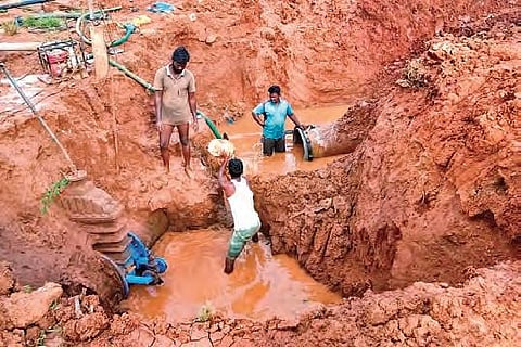 Municipal engineering staff repair a pipeline, which recently developed a leakage, in Sangareddy town headquarters.