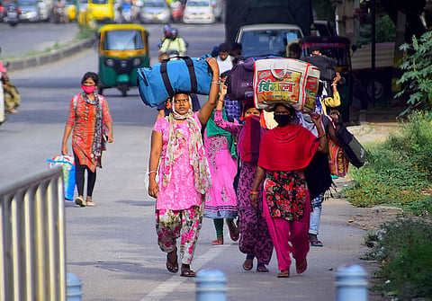 Migrant labourers walking to their native places. (Photo | Pandarinath B/EPS)