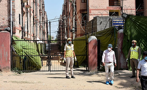 Police personnel stands guard at the Quarantine facility Centre at Dwarka sector 16 for Nizamuddin Markaz Tablighi Jamaat in New Delhi.  (File Photo | Shekhar Yadav, EPS)