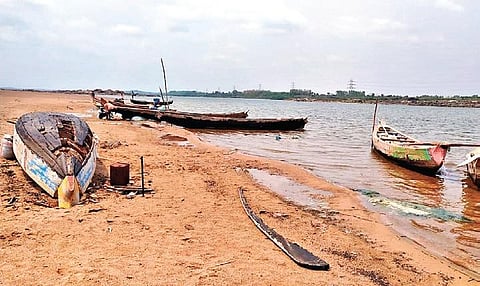 Fishing boats lie unused on the banks of the Godavari in Bhadrachalam