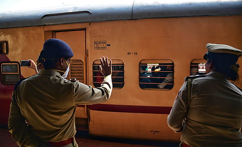 Passengers including many migrant workers heading to board the first Shramik Special of SWR from platform one of Chikkabanavara railway station on Sunday morning. (Photo | Shriram BN/EPS)