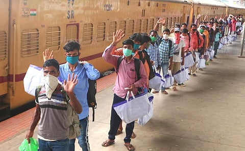 MIgrant workers bid adieu before boarding the special train to Jharkhand  (Photo |EPS/TP Sooraj)