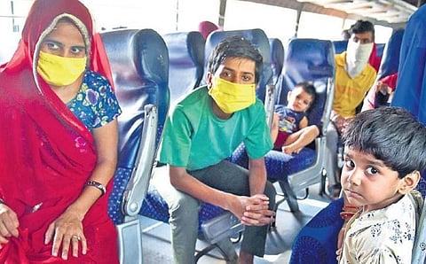 Workers employed by shops in Sowcarpet and their family members after  boarding the bus bound to Jodhpur on Thrusday | R Satish Babu