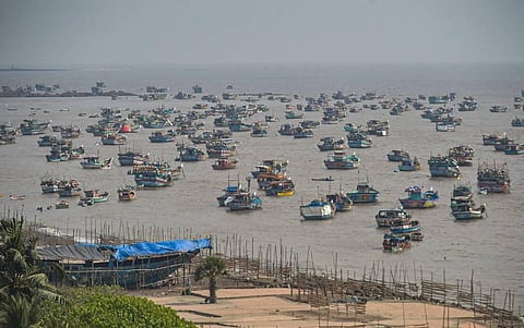 Fishing boats seen anchored at a shore following a warning by Indian Meteorological Department IMD for fishermen not to enter the Arabian Sea for the next two days as a precaution against cyclone 'Nisarga' at Uttan beach in Thane Monday. (Photo | PTI)