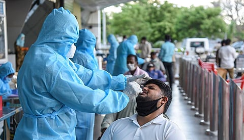 Health officials collecting swab samples. (Photo| Ashok Kumar, EPS)