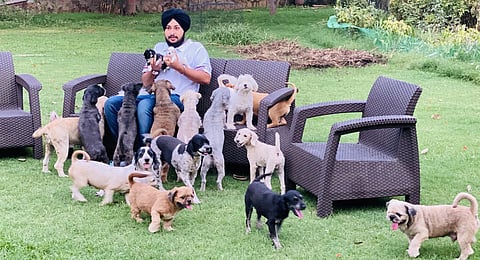 Harshdeep Singh of Tegha Kennel with his pets at the farm in Chhatarpur