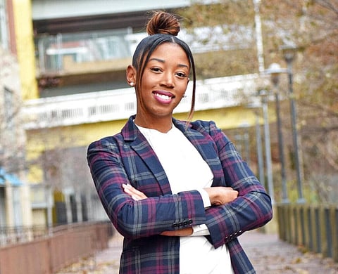 Pittsburgh Post-Gazette reporter Alexis Johnson in Pittsburgh. Johnson, who was prohibited from covering the city's Black Lives Matter protests because of a tweet, sued the paper on Tuesday. (Photo | AP)