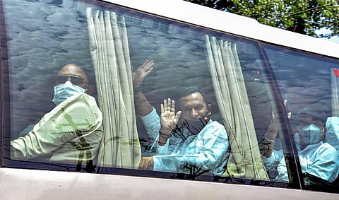 Congress MLAs board a bus towards State Assembly to cast their vote for Rajya Sabha elections in Bhopal Friday June 19 2020. (Photo  | PTI)