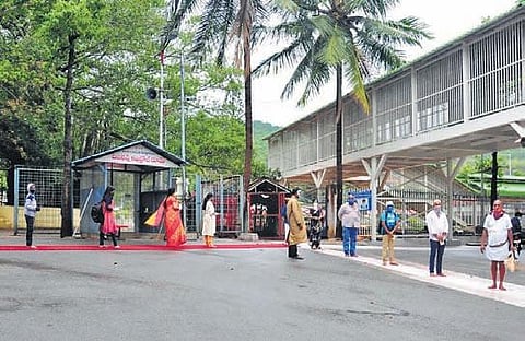 Wearing masks and maintaining social distancing, devotees seen lining up  at Tirumala temple for darshan. (Photo | AP)