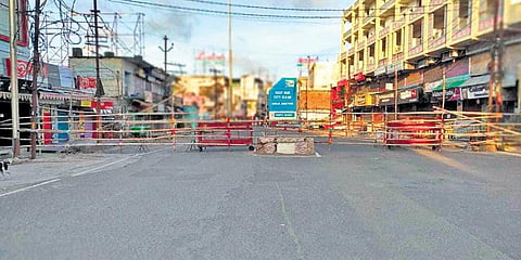 Barricades put up on a road in Berhampur. (Photo | EPS)