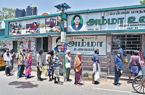 People waiting outside Amma canteen near Esplanade, Parktown, in Chennai  on Saturday | R Satish Babu