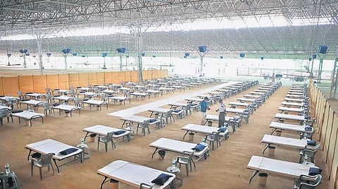 Volunteers prepare a facility at Radha Soami Satsang Beas complex at Chhatarpur. With 10,000 beds, it is dubbed as biggest COVID-19 facility in India. (Photo | Shekhar Yadav, EPS)