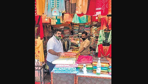 Trader Ashok Randhawa opens his shop on Day 1 of Unlock-1 in Delhi (Photo | EPS)