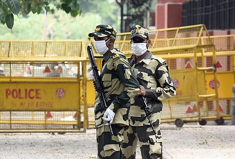 Border Security Force (BSF) personnel stands guard outside a hospital during a government-imposed nationwide lockdown. (Photo | Parveen Negi, EPS)