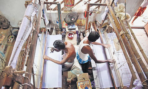 Members of Anakaputhur Jute Weavers  Association at work.  (Photo | EPS/R Satish Babu)