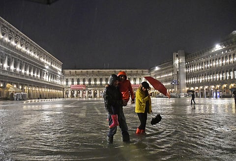 Venice has been submerged by a near-record high tide that is rare for this time of year. (Photo | AP)