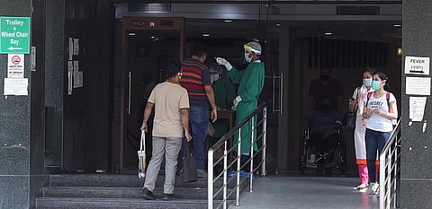 Visitor being scanned by thermal device at Sir Ganga Ram Hospital in New Delhi on Saturday.  (Photo | Anil Shakya/EPS)