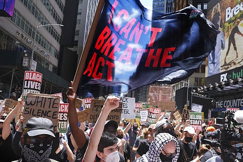Black lives matter protesters rally near the edge of Times Square in New York, Sunday. (Photo | AP)