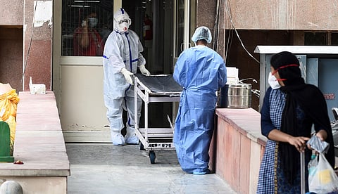 Medical workers in PPE gear outside the COVID-19 ward . (Photo | Parveen Negi/EPS)