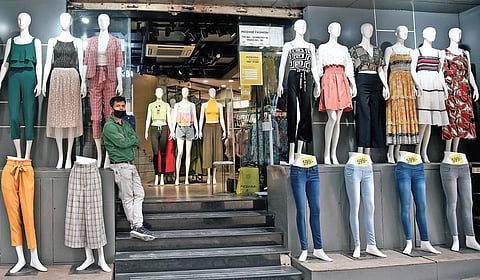 A shopkeeper waits for customers at Sarojini Nagar Market; a deserted look of Connaught Place, by far the busiest place in the national capital on a regular day. Most of the people working in these stores are from Uttar Pradesh, Bihar and Jharkhand (Photo