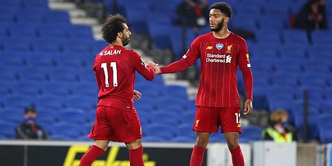 While the Premier League title has already been won by Liverpool in record time, the battle to finish as the top-flight's leading scorer is set to go down to the wire. Here are the top contenders. (Photo | AP)