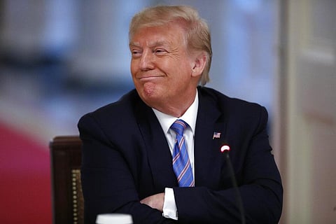 US President Donald Trump listens during a 'National Dialogue on Safely Reopening America's Schools,' event in the East Room of the White House, Tuesday, July 7, 2020, in Washington. (Photo | AP)