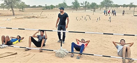 NSG commando Sandeep Singh Shekhawat trains youngsters at his academy at Alsisar town in Jhunjhunu district | Express