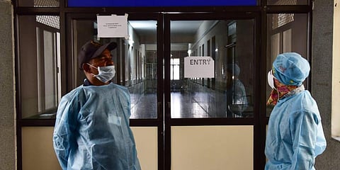 Private security personnel in PPE suits outside an isolation ward at an hospital. (File photo| Vinay Madapu, EPS)