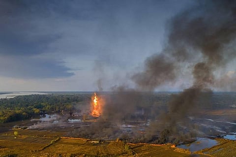 An aerial view of the Baghjan oil field engulfed in fire, in Tisukia, Assam (File photo | PTI)