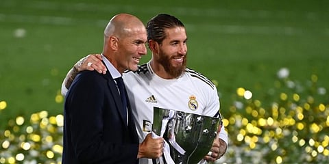 Real Madrid gaffer Zinedine Zidane and captain Sergio Ramos pose with the La Liga trophy  (Photo | AFP)