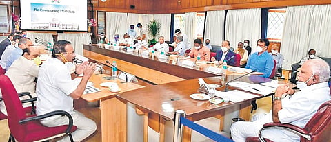 Chief Minister B S Yediyurappa during a meeting with zonal in-charge ministers at Vidhana Soudha on Friday | express