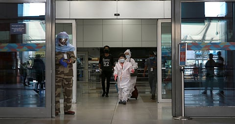 (Image for representation) Passengers wearing PPE ket arrive at the Indira Gandhi International airport during the first day of resuming of domestic flights after the government imposed a nationwide lockdown as a preventive measure against the spread of t
